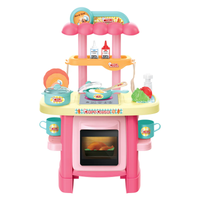 Toy kitchen set with various accessories on a white background