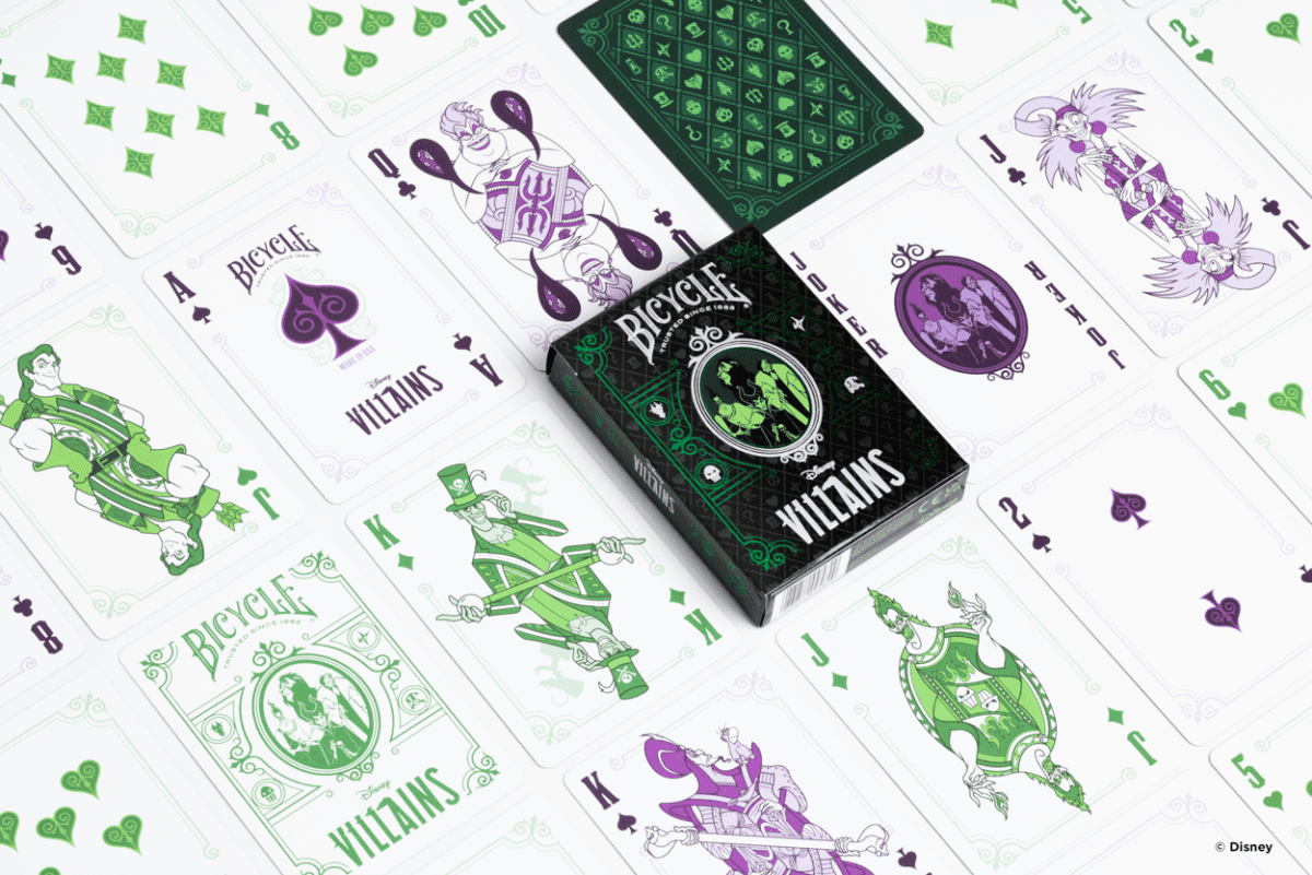 Bicycle Villains playing cards with green and purple designs on a white background