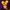 Person wearing an orange cap with a pumpkin design against a purple background