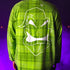 Green plaid shirt with white graphic design on a purple background