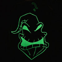 Glowing green silhouette of a character on a black background