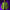 Person wearing a green plaid shirt against a purple background with string lights.