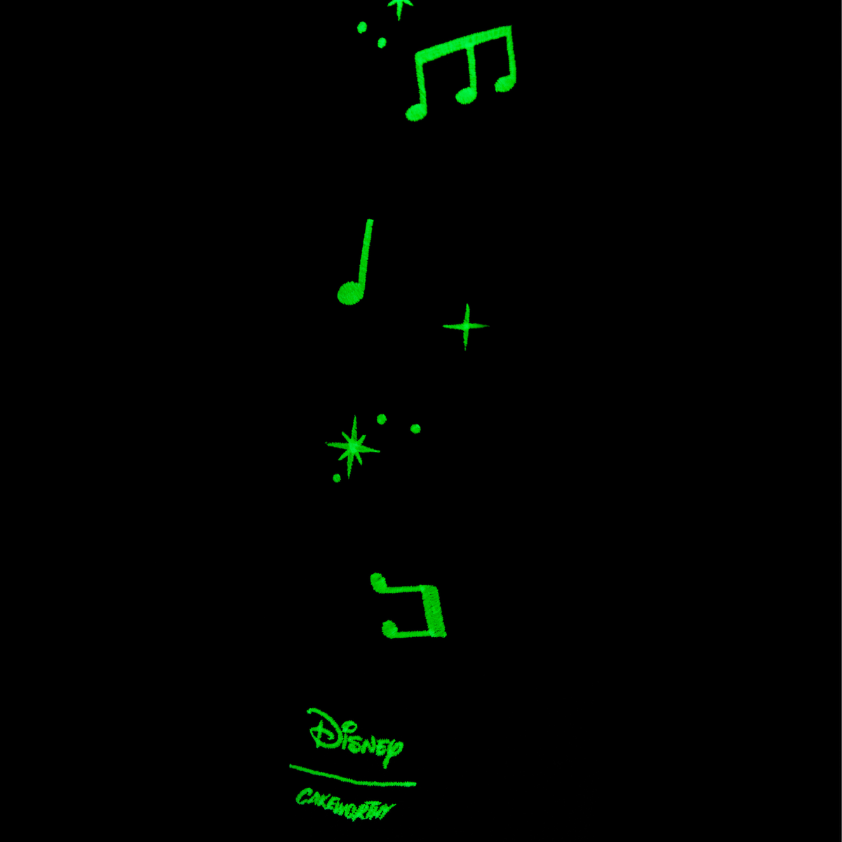 Glowing green musical notes and symbols on a black background with Disney logo.