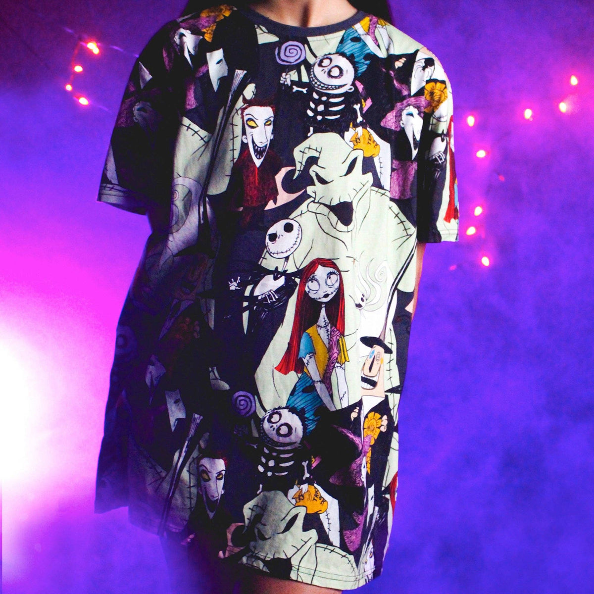 T-shirt with cartoon character print on a purple background