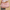 Person holding a Cakeworthy Harry Potter Birthday Duffle Bag against a beige background