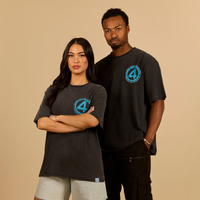 Two people wearing black t-shirts with a blue logo on a beige background