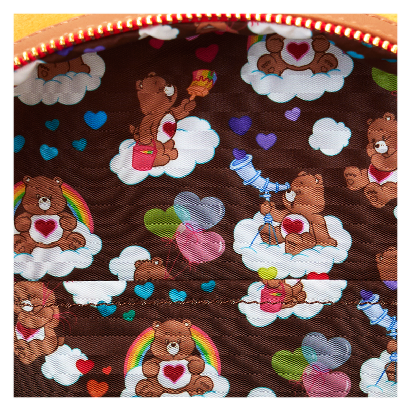 Exclusive Loungefly Care Bears mini backpack with glowing features and character-inspired design