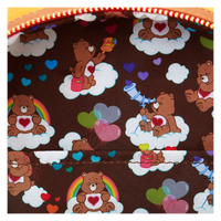 Exclusive Loungefly Care Bears mini backpack with glowing features and character-inspired design