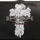 Black box with white decorative design and text 'DEATH' on a black background