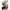 Front cover of the manga volume 9 of Demon Slayer: Kimetsu no Yaiba, featuring the main character Tanjiro Kamado in a dynamic pose with a sword, set against a colorful illustrated background with the title and author name visible.