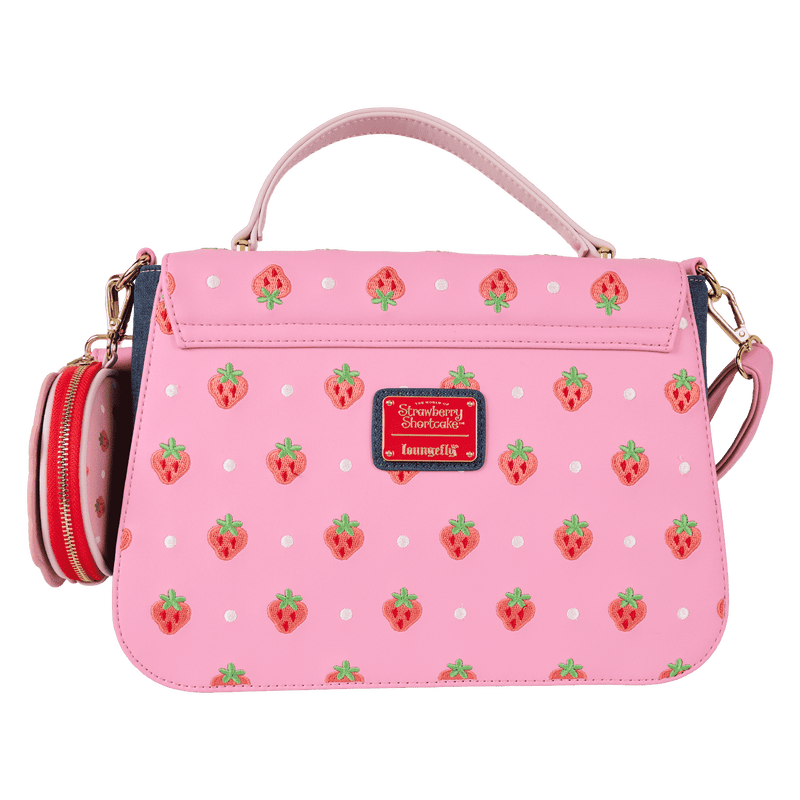 Cute crossbody purse with Strawberry Shortcake character, gingham trim, and denim body

