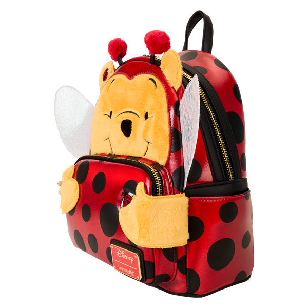 Charming Loungefly Disney Winnie the Pooh mini backpack, with Pooh as a ladybug, complete with adorable 3D details and a colorful, playful design.