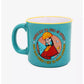 A ceramic mug with a colorful illustration of the character Kuzco from 'The Emperor's New Groove' with a humorous quote about Kuzco's ego.
