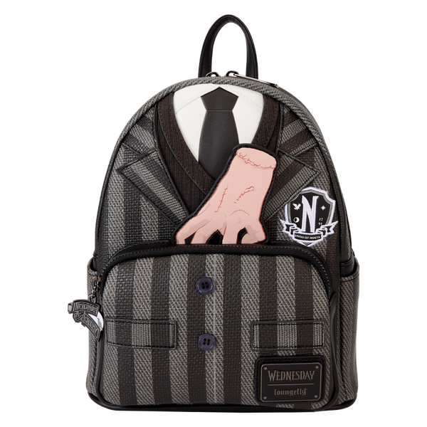 Close-up of Nevermore Academy cosplay mini backpack showing crest emblem and button details