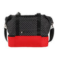 Black and white patterned bag with a red bottom section on a white background