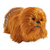 Plush toy resembling a character with brown fur and a belt on a white background