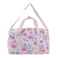 Pink duffel bag with cartoon animal and flower pattern on a white background
