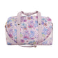 Pink duffel bag with cartoon character and floral pattern on a white background