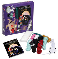 Crochet kit with yarn and book featuring 'The Nightmare Before Christmas' characters on a white background.