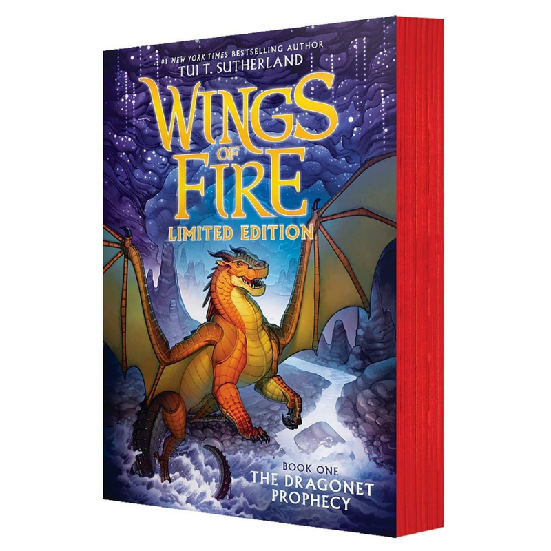 Wings of Fire Limited Edition book by Tui T. Sutherland, featuring a red spine and a cover illustration of a yellow-orange dragon in a snowy landscape under a purple night sky.