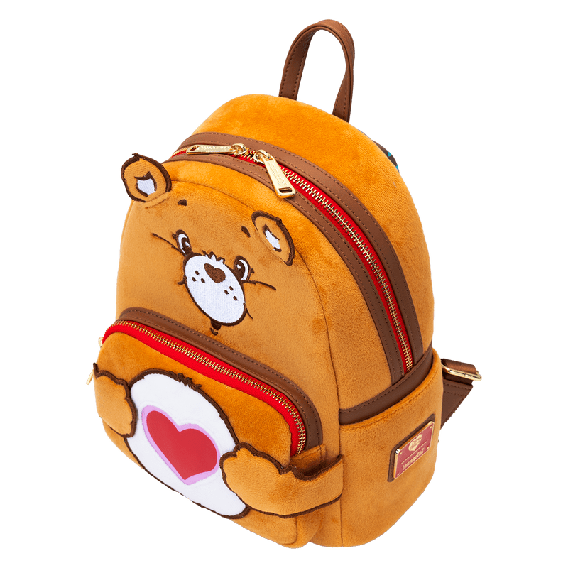 Exclusive Glow Plush Tenderheart Bear mini backpack by Loungefly with character-inspired details