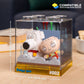 Two small figurines in a clear display case with 'Family Guy' branding and measurements.