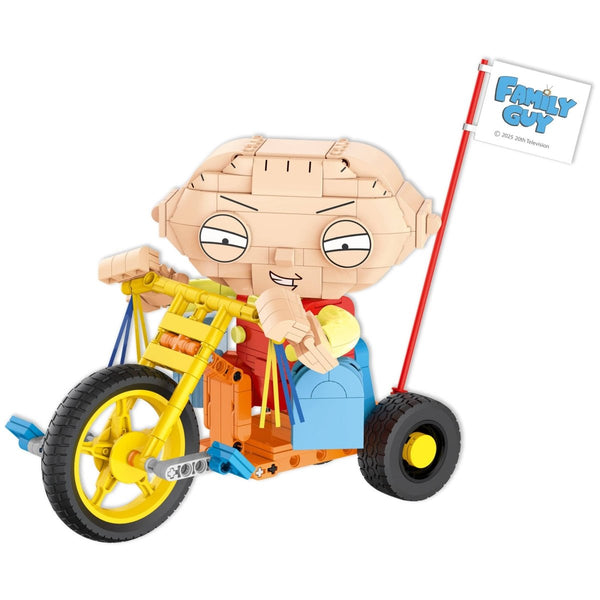 Toy figure of a character from 'Family Guy' riding a bike with a flag, on a white background.