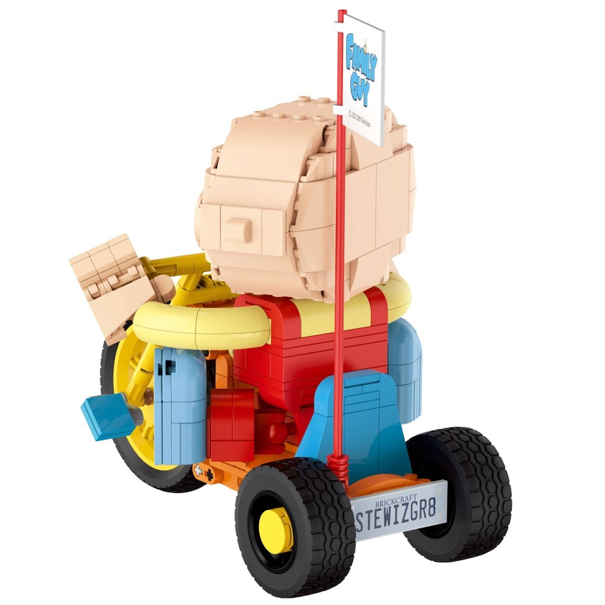 Toy truck with a large beige box on a white background
