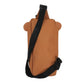 Brown sling bag with a black strap on a white background