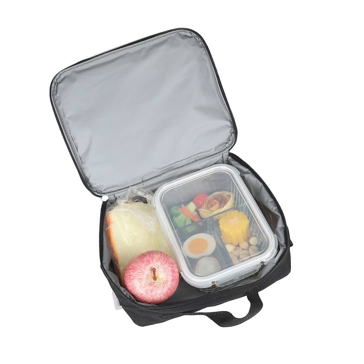 Black insulated lunch bag with a bento box containing food items on a white background