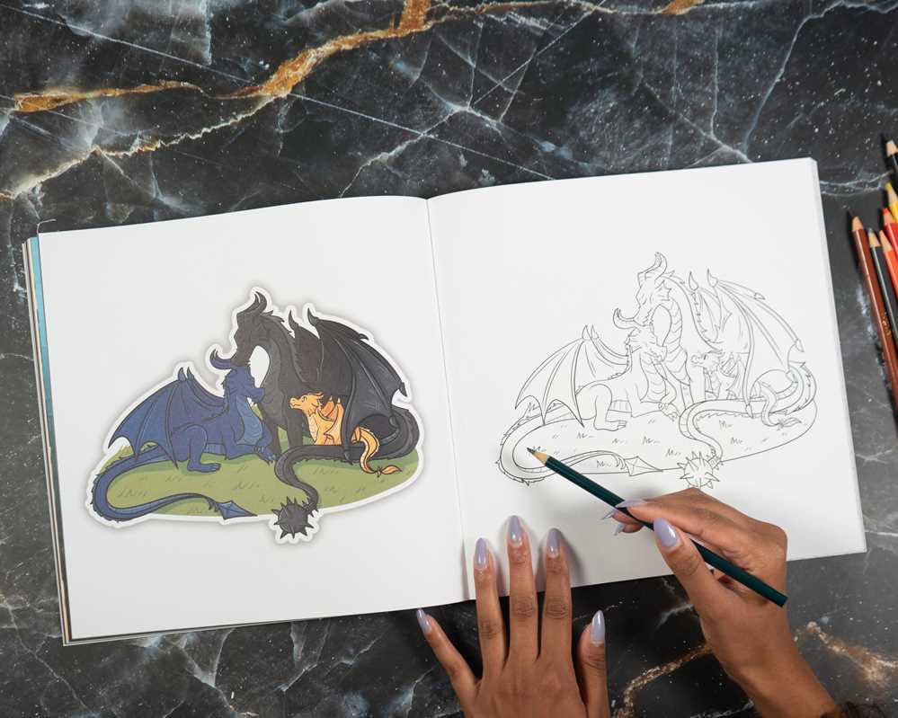 Coloring book with dragon illustration, completed on one side and in progress on the other, on a marble surface.