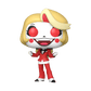 Animated character figurine with blonde hair, red polka dot eyes, and a red outfit on a white background