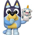 Blue and yellow cartoon character holding a small white creature with a yellow horn on a white background