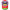 Colorful cartoon-like character with a red body, purple face, yellow nose, and green feet on a white background.