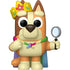 Cartoon dog character with a crown, wand, and magnifying glass on a white background