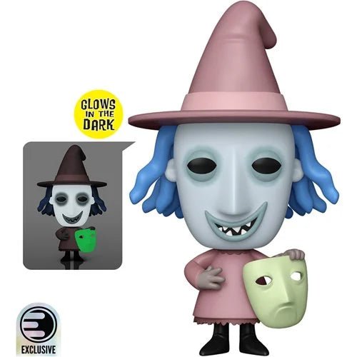 Funko Pop! vinyl figure of shock featuring a pale blue mask, pink witch hat and dress, blue hair, and holding a light green theatrical mask. Includes a 'Glow in the Dark' inset showing the figure glowing green in the dark, and an 'Exclusive' badge.