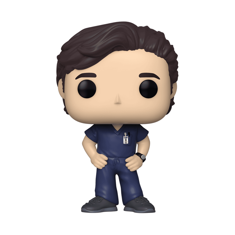 A stylized vinyl figure of a male medical professional with brown hair, wearing navy blue scrubs and dark gray shoes, set against a plain white background.
