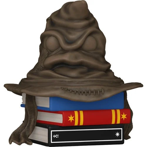 Decorative item resembling a Sorting Hat from a fantasy book with books underneath on a white background
