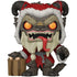 Funko Pop! vinyl figure of a monstrous Santa-like creature with dark gray fur, white beard, red clothing, and glowing orange eyes, holding a small gift basket against a plain white background.