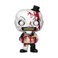 Horror-themed figurine with white face, black eyes, and red accents on a white background