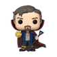 A Funko Pop! vinyl figure of a detective version of Doctor Strange, featuring a beige skin tone, brown hair and beard, a blue jacket over a white shirt, a dark red and brown cape, and holding a gold medallion and a shovel.