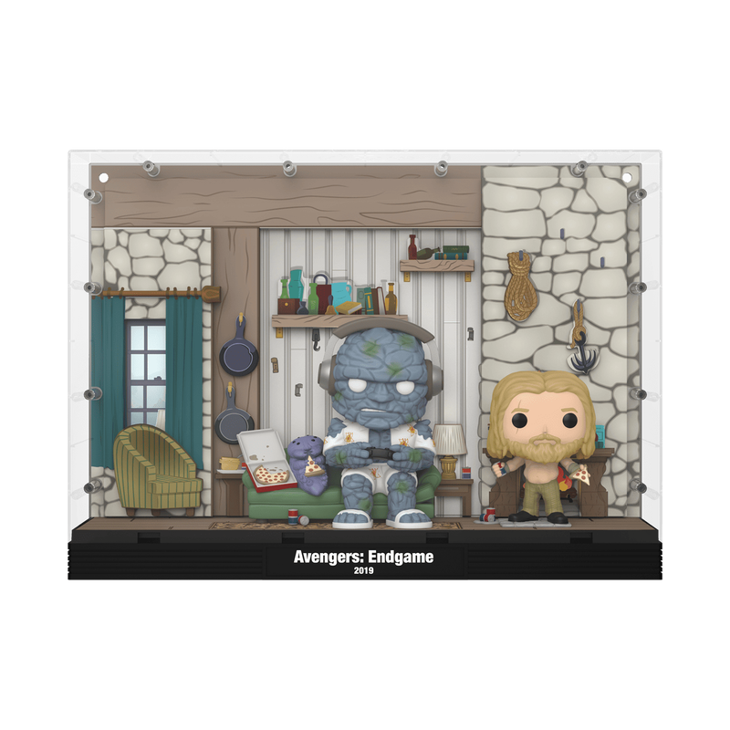 A collectible display case featuring Funko Pop! figures from Avengers: Endgame. The clear acrylic case showcases two figures: a blue-green Hulk sitting on a couch holding popcorn, and a blonde Sam Wilson holding a mug.