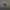 Yellow superhero figure with glowing eyes on a dark background
