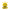 Yellow and black cartoon character with a prominent horn on a white background