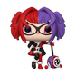 Figurine with red and purple hair, glasses, and a unique outfit on a white background