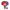 Figurine with red and purple hair, glasses, and a unique outfit on a white background
