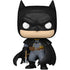 Batman figurine with cape and mask on a white background