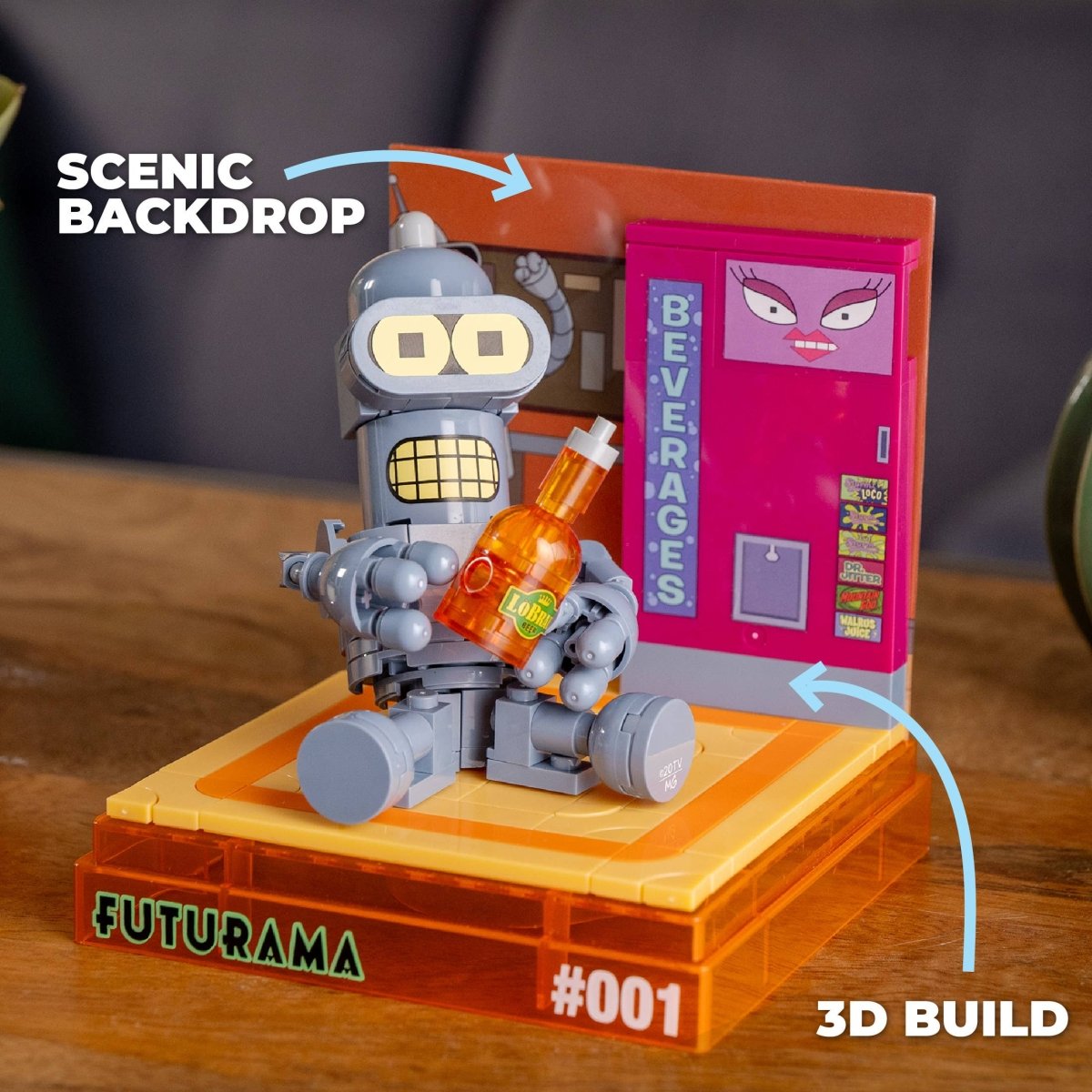 Toy robot holding a bottle with a scenic backdrop featuring a vending machine and 'Futurama' branding.