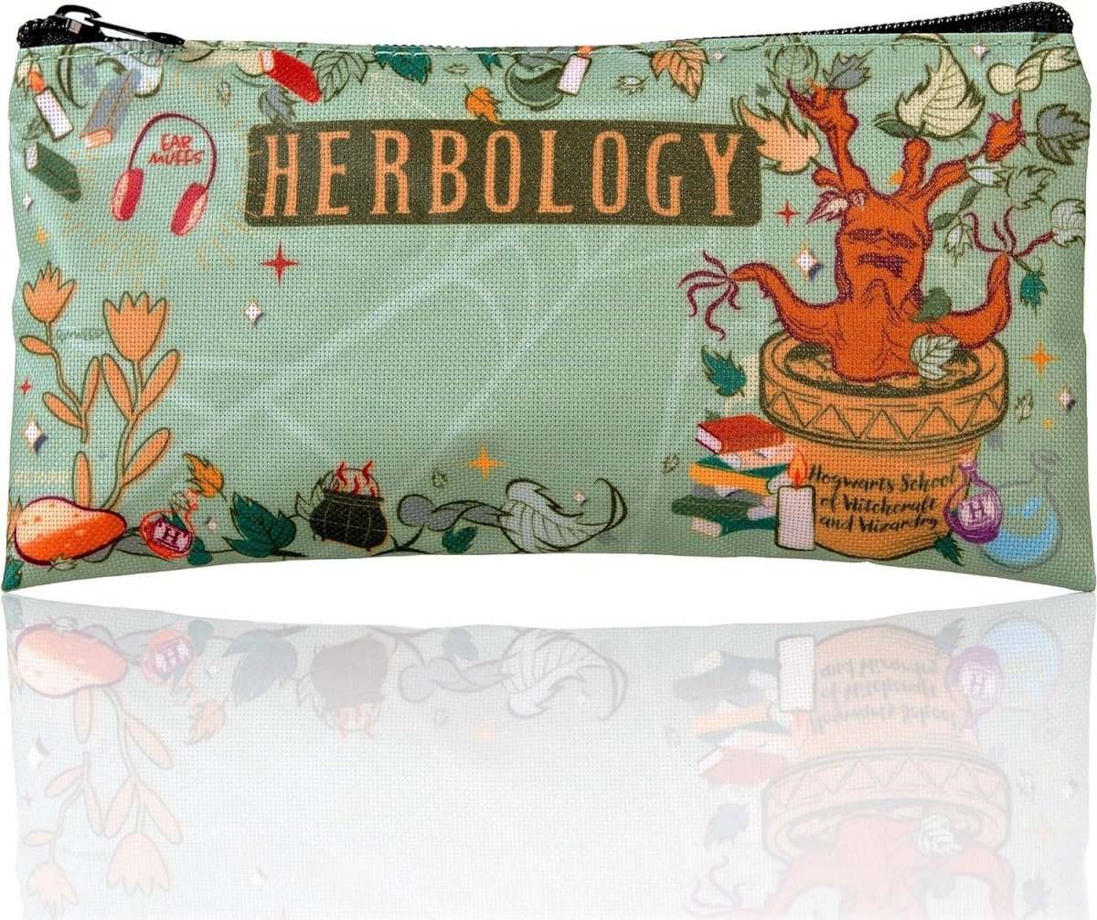 Pencil case with 'Herbology' design featuring a dragon and plants on a green background.