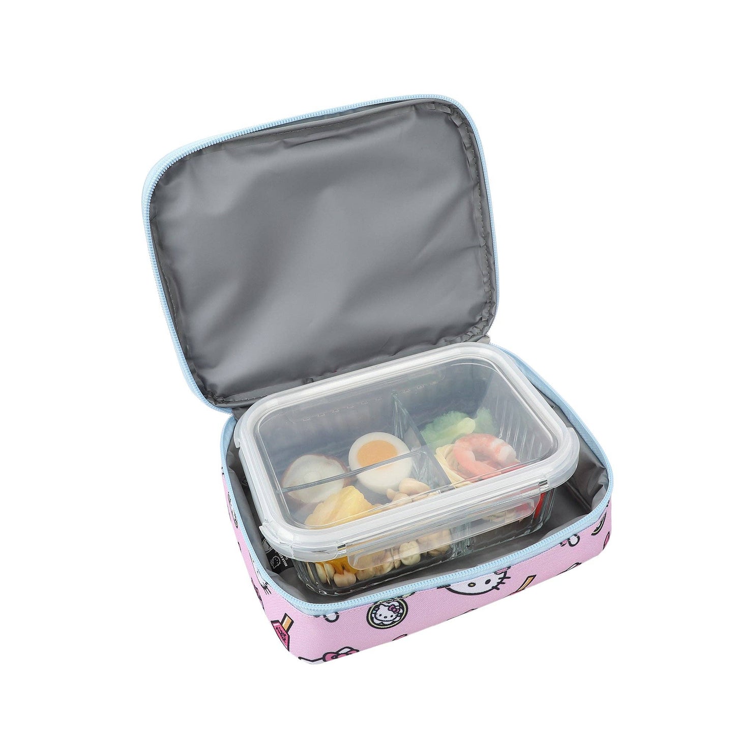 Pink lunch box with food compartments on a white background